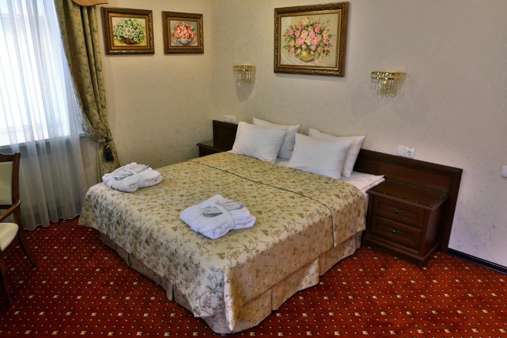 Hotel Ukraine Ρίβνε Δωμάτιο φωτογραφία
