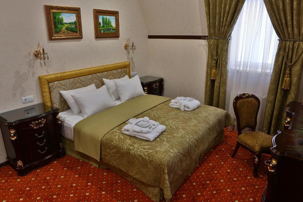 Hotel Ukraine Ρίβνε Δωμάτιο φωτογραφία